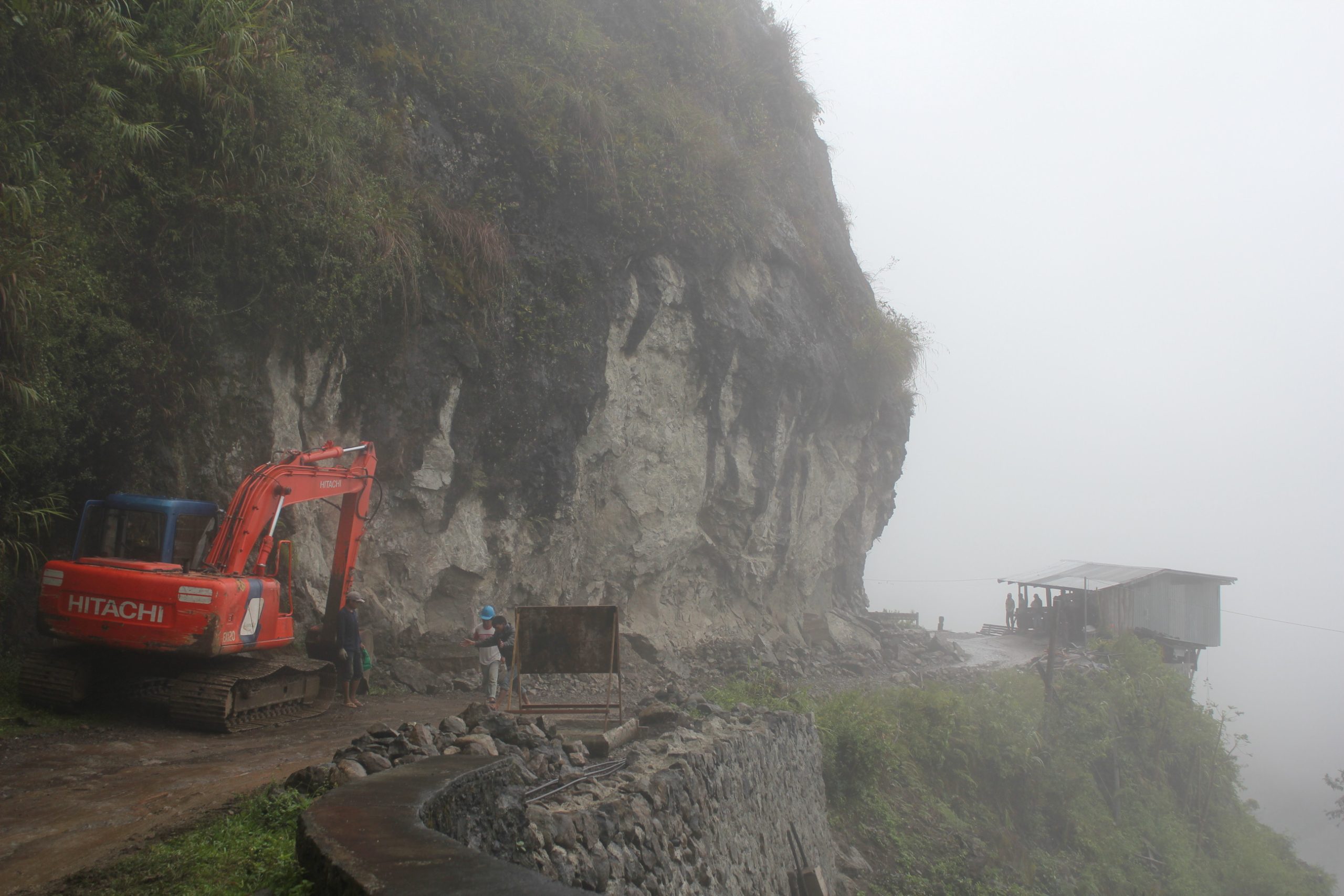The narrow cliff-edge road leading to the Bangaan Rice Terraces