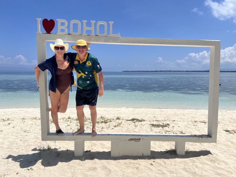 Dezza and his cousin on the Virgin Island sandbar, Bohol