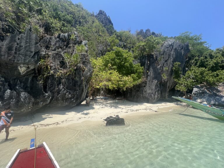 Arriving by boat at Payong-Payong Beach, Miniloc Island, Palawan