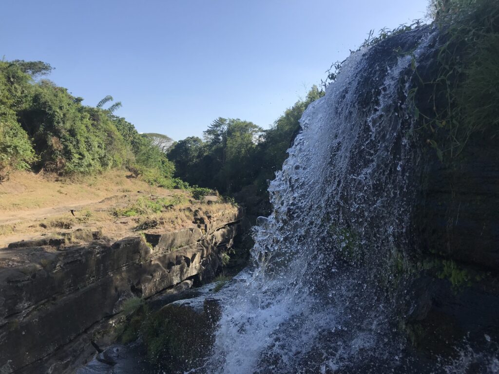 Water pouring over the cliff into the canyon at Pantihan Falls, Maragondon, Cavite