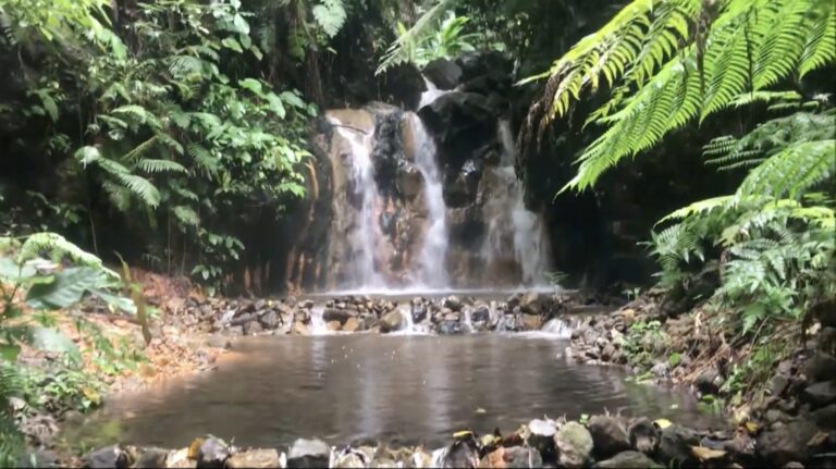 Baslay Hot Springs waterfall and pool near Dauin