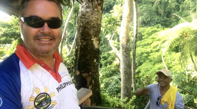 Dezza and guide Tommy on the trail to Casaroro Falls, Negros Oriental