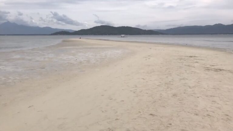 Exposed white sand of Manjuyod Sandbar at low tide