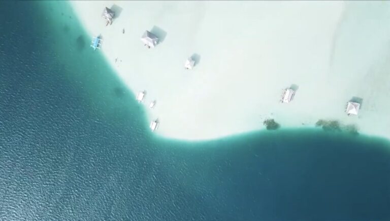 Aerial view of the white sandbar and cottages at Manjuyod, Negros Oriental