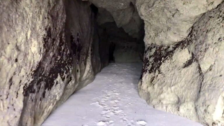 Narrow sandy passage inside a cave at Ramos Caves, Nasugbu
