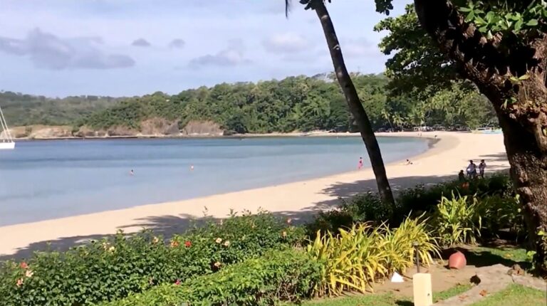 Calm bay and long sandy beach at Terrazas de Punta Fuego, Nasugbu, Batangas
