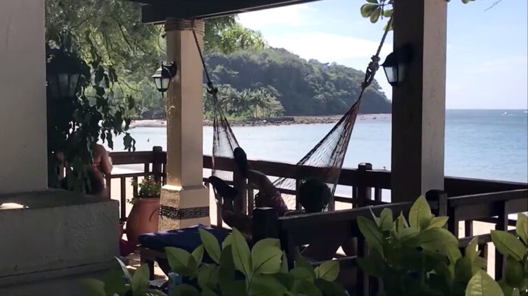 Beachfront hut with hammocks looking over the bay at Terrazas de Punta Fuego